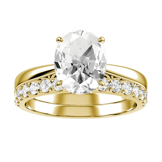 Yellow Gold Oval Cut Diamond Engagement Ring with Matching Wedding Band