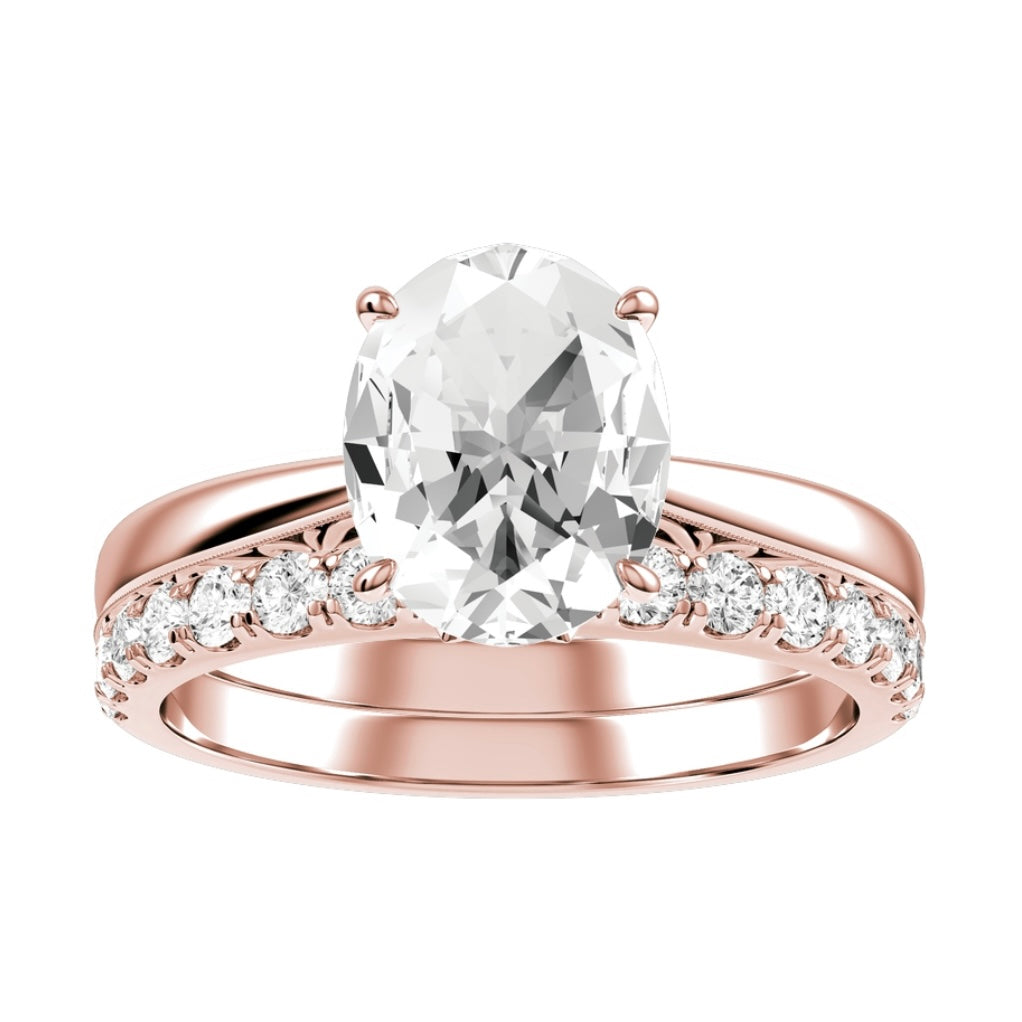 Rose Gold Oval Cut Diamond Engagement Ring with Matching Wedding Band